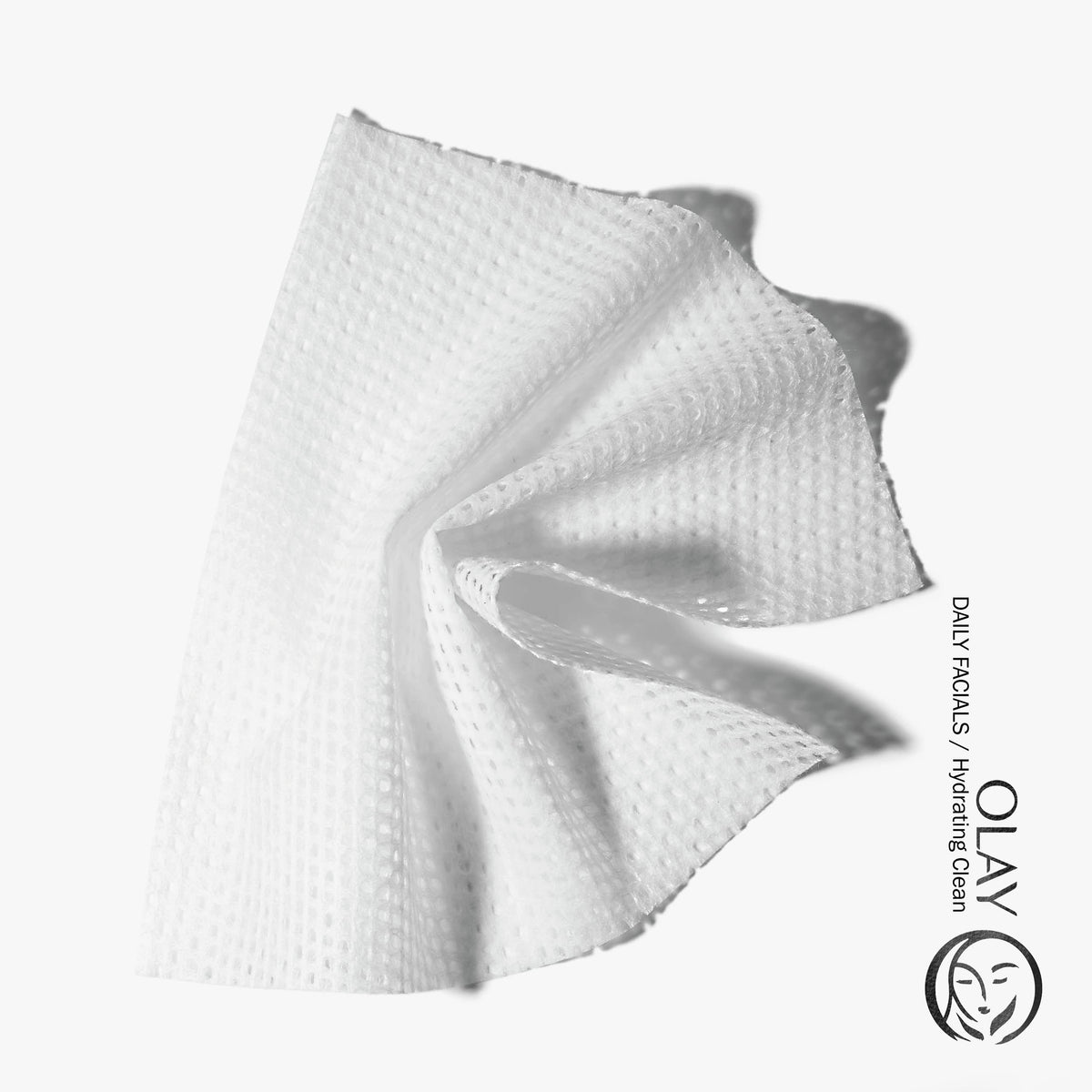 Olay cloth close-up texture on smooth side, highlights gentle makeup removal
