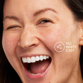 Olay sunscreen in a bathroom setting illustrating morning routine convenience and protection