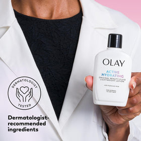 Olay bottles on bathroom vanity suggesting daily routine convenience benefit