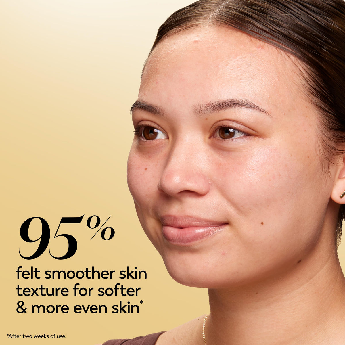 Olay moisturizer being applied to cheek for hydrated, smoother-looking skin