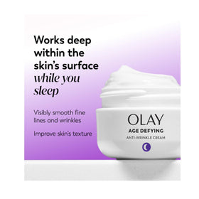 Olay open jar with visible cream illustrating nourishing consistency