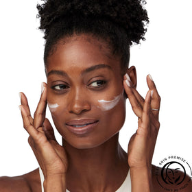 Olay Regenerist applied to hand showing quick absorption and dewy finish
