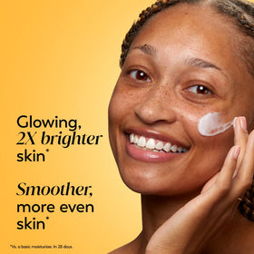 Olay cream being applied to cheek demonstrating quick absorption benefit