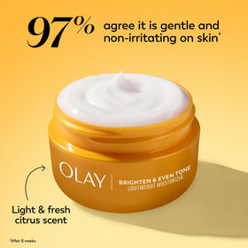 Olay jar on bathroom vanity styled with towel showing daily routine benefit