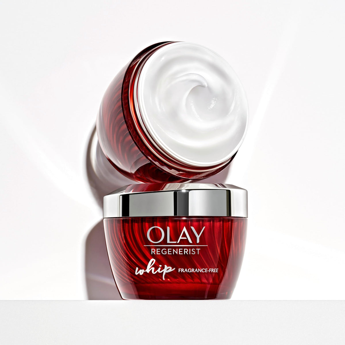 Olay Regenerist Whip on bathroom shelf in a skincare routine setting for daily use