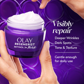 Olay jar next to ruler for scale, conveys compact 2.6oz size and travel convenience