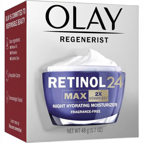 Olay cream on fingertips illustrating easy spreadability and fast absorption