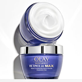 Olay jar next to ruler showing 1.7oz size for travel and shelf comparison