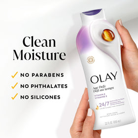 Olay bottle held next to hand for size comparison, shows 22 fl oz scale