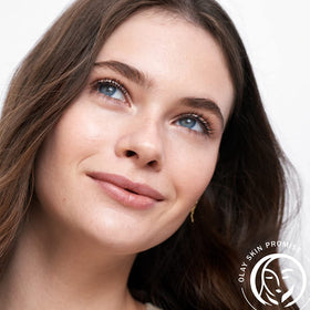 Olay toner in use on face demonstrating oil removal and refreshed matte finish