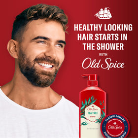 Tea tree leaves and mint sprigs next to Old Spice bottle showing natural refresh