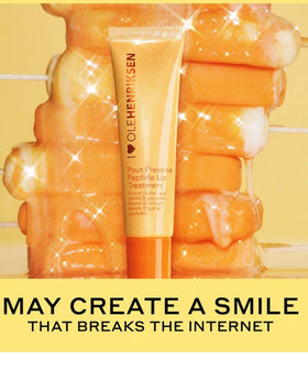 Ole Henriksen in-use application on lips, demonstrates visible plumping and glow