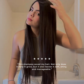 OLÉ shampoo on bathroom shelf with plants, conveys hydration and frizz control benefit