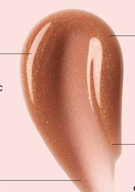 Ole Henriksen close-up of creamy shimmer texture, showing hydrating, non-greasy finish