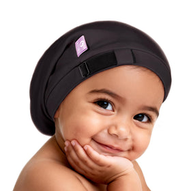 OLESILK bonnet front view showing neat fit and secure coverage for baby hair protection