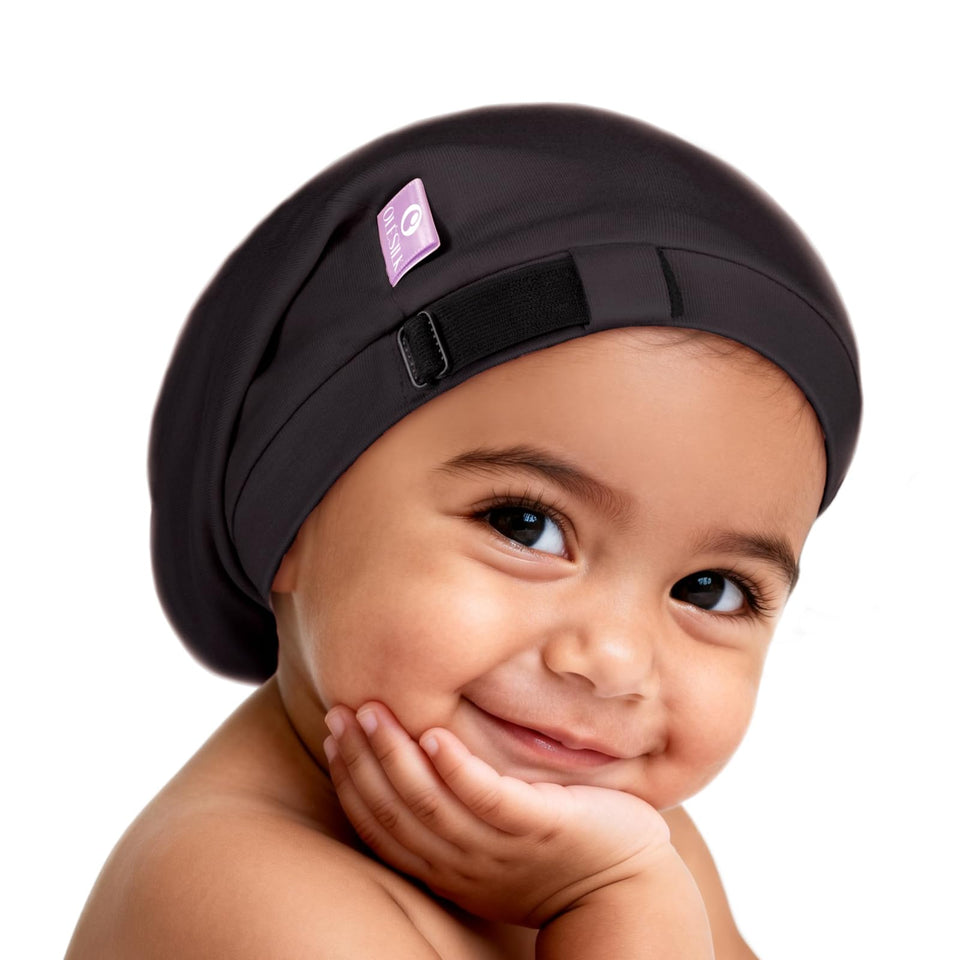 OLESILK bonnet front view showing neat fit and secure coverage for baby hair protection