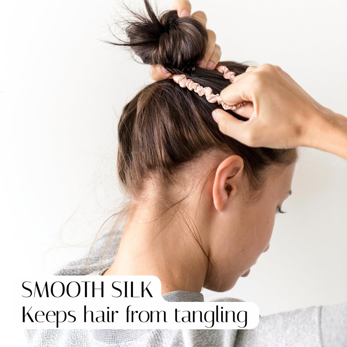 OLESILK visible elastic core detail demonstrating durable hold for thin hair stability