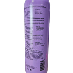 Oligo Professionnel next to ruler showing 8.5 oz size for scale