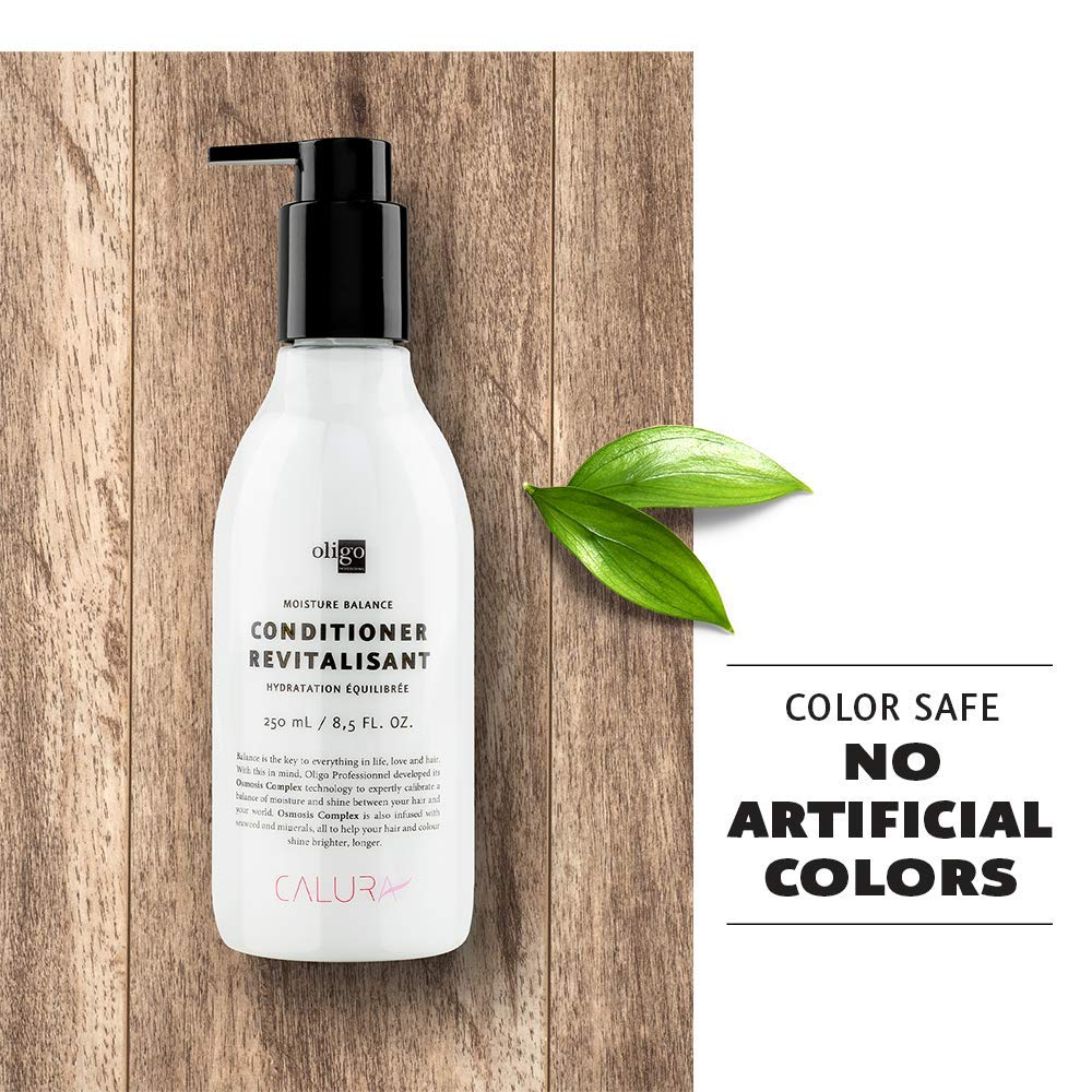 Oligo Professionnel bottle in hand showing 8.5 oz scale and portability