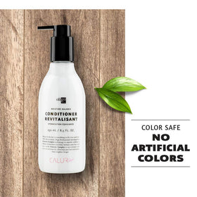 Oligo Professionnel bottle in hand showing 8.5 oz scale and portability