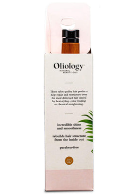 Oliology conditioner cream consistency on hand showing smoothing and detangling benefit