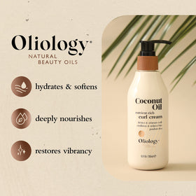 Hand applying Oliology curl cream to damp curls for defined, frizz-free waves