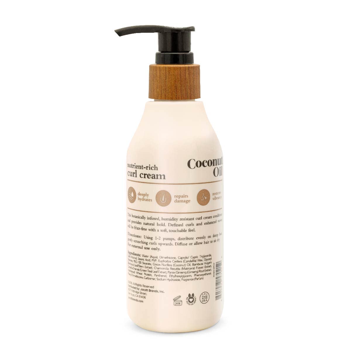 Close-up texture of Oliology curl cream highlighting creamy, lightweight formula