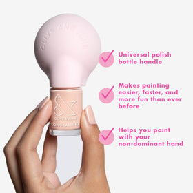 Olive & June Poppy attached to bottle side profile demonstrating stable counterweight benefit