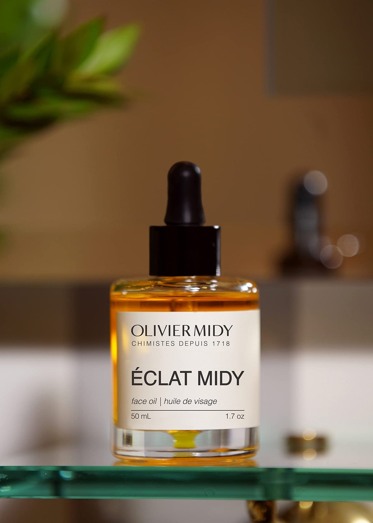 Olivier Midy label detail zoom on BA106 callout to emphasize targeted anti-aging technology