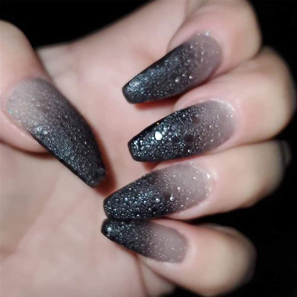 Omainy brush close-up demonstrating smooth application and precise control