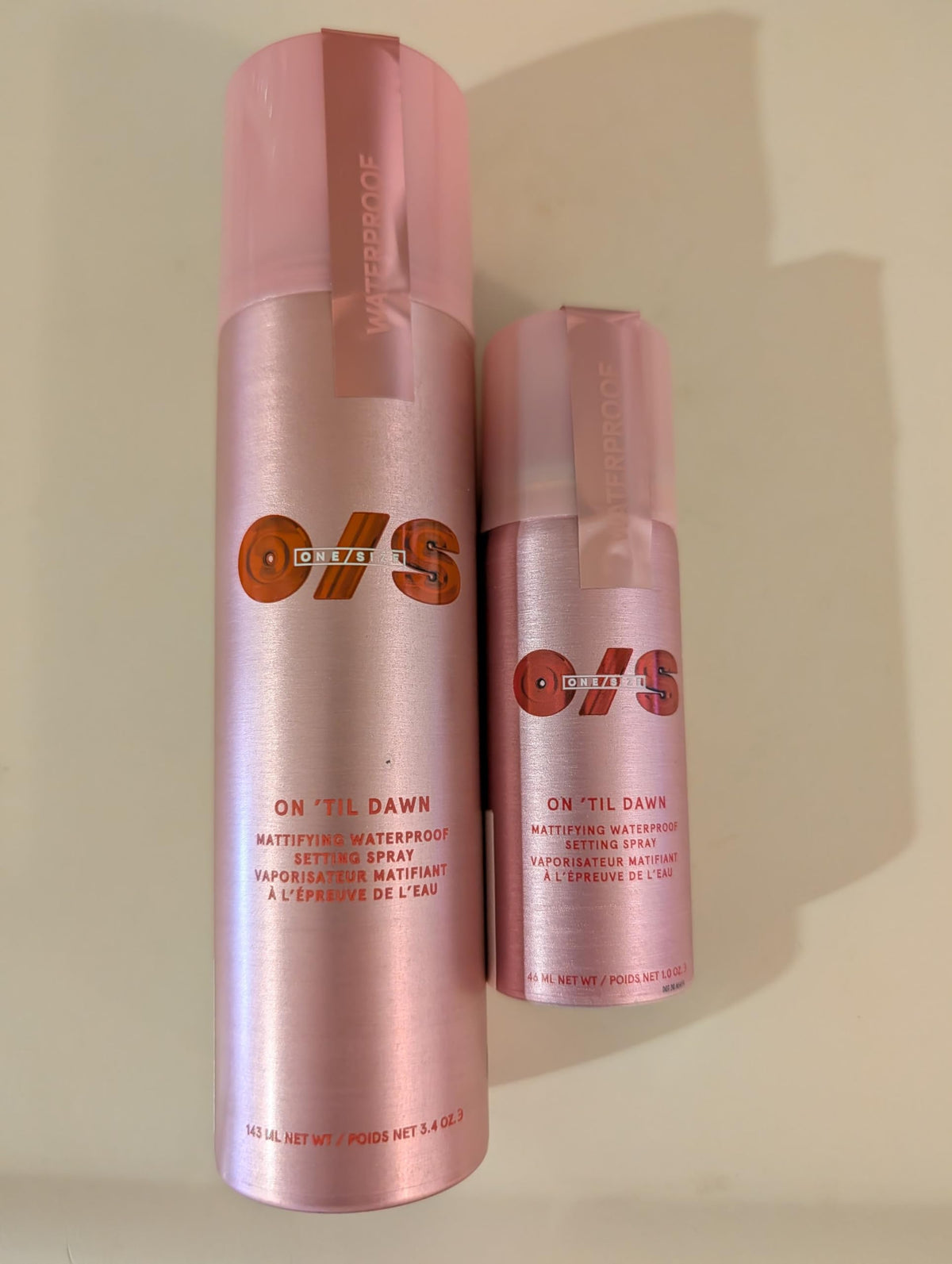 ONE/SIZE applying spray on finished makeup for long-lasting wear and shine control