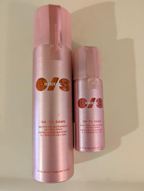 ONE/SIZE applying spray on finished makeup for long-lasting wear and shine control