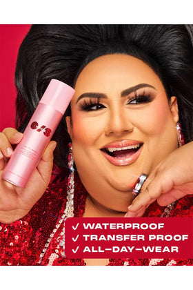 ONE SIZE spray in use on model, demonstrates long-lasting matte hold during activity