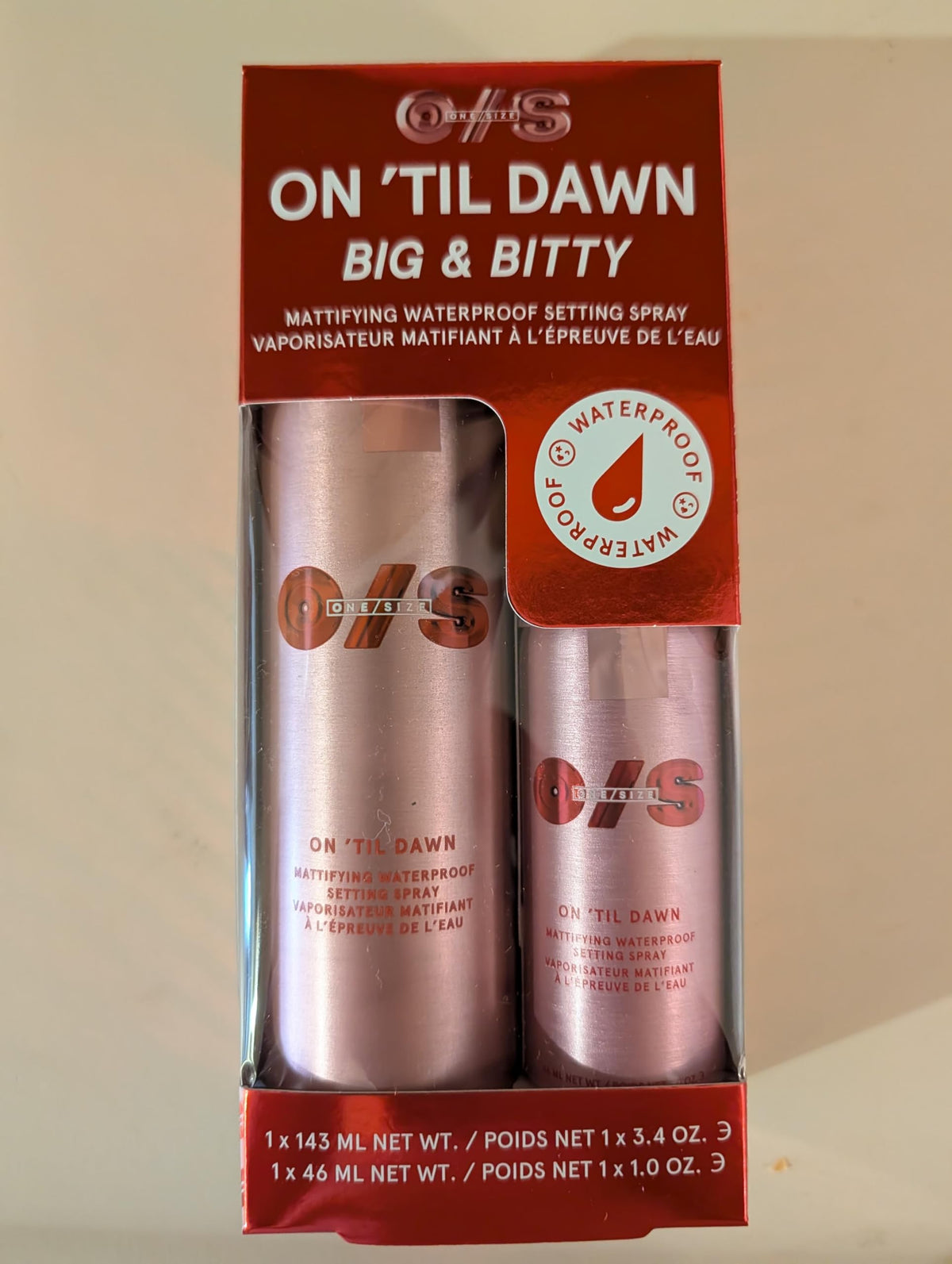 ONE/SIZE travel-size bottle in hand illustrating portability and quick touch-up benefit