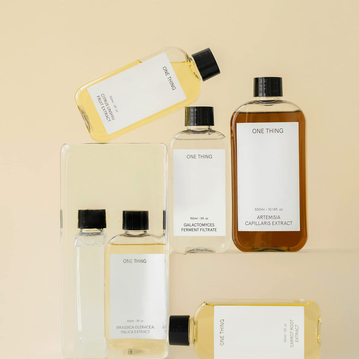 ONE THING drops on skin detail showing lightweight finish and nourishment