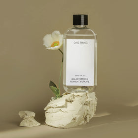 ONE THING on bathroom shelf in lifestyle scene suggesting everyday use