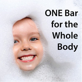 One With Nature bar held in hand showing size and convenient travel-ready use