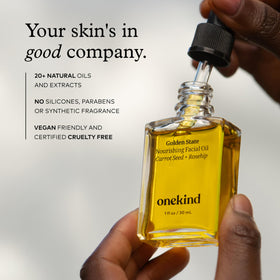 Onekind oil applied to hand illustrating smooth spread and fast absorption benefit