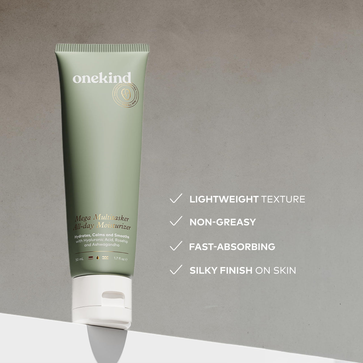 Onekind jar open with visible cream, shows product consistency and ease of use
