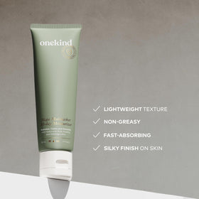 Onekind jar open with visible cream, shows product consistency and ease of use