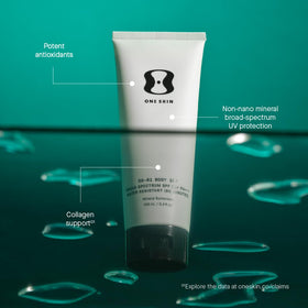 oneskin body in beach setting illustrating water resistance and outdoor use