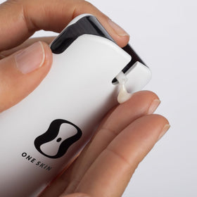 oneskin applied to hand, illustrates smooth application and hydration