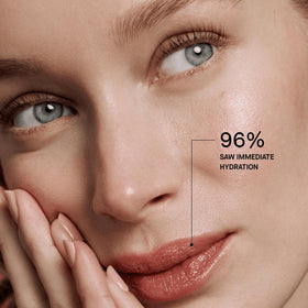 oneskin lip being applied to lips for sheer tint and sun protection benefit