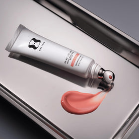 oneskin lip in outdoor setting demonstrating daily SPF and antioxidant benefit