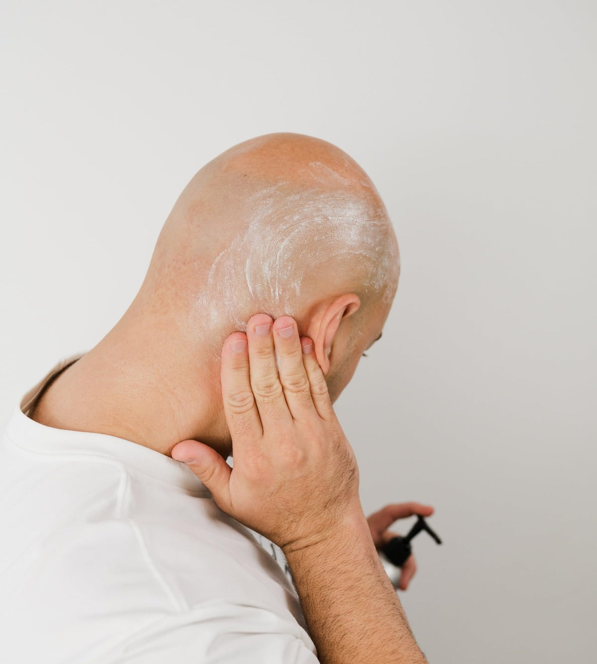 Balds LLC cleanser being poured and foaming to show lathering action