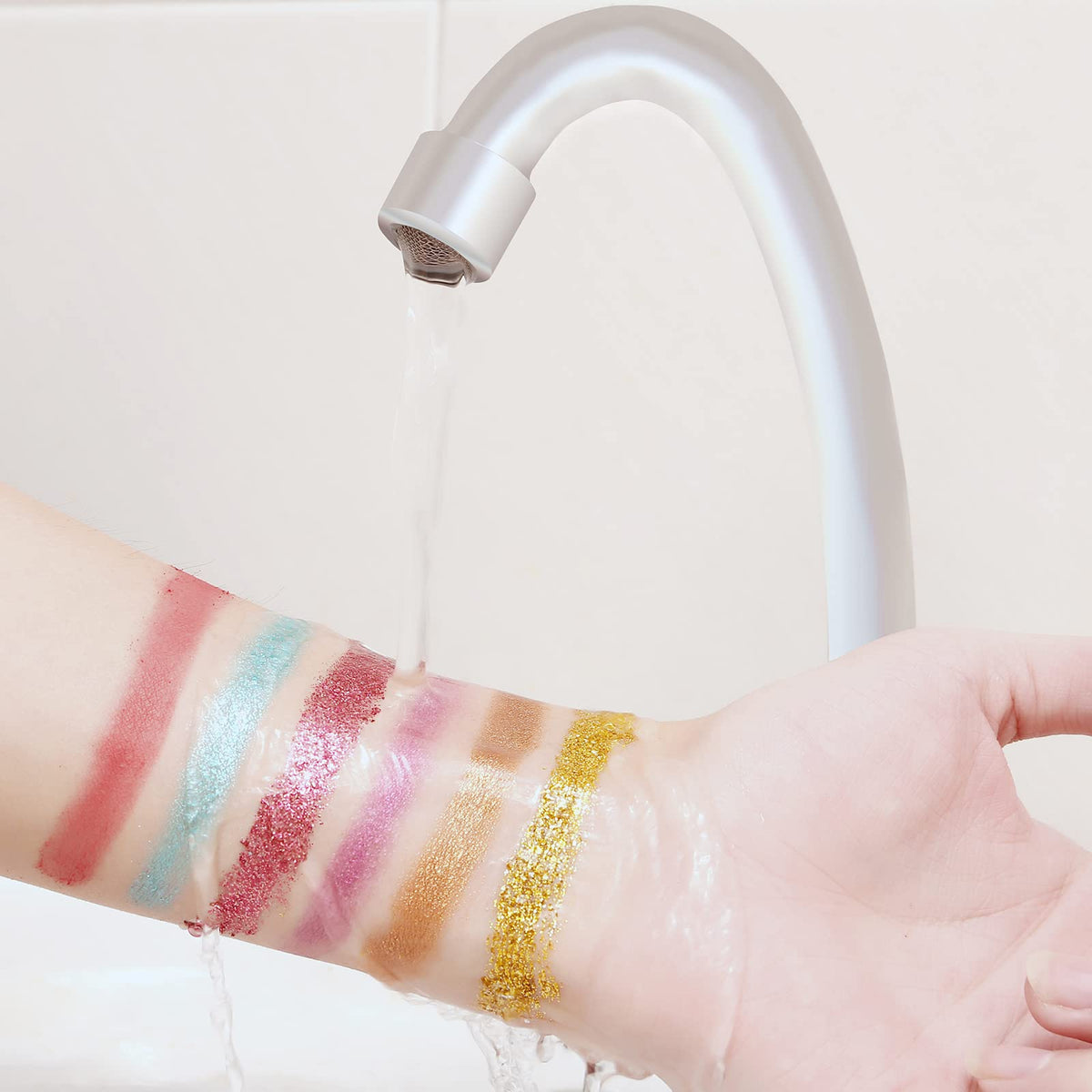 ONLYBETTER palette held in hand to show size and travel-friendly benefit