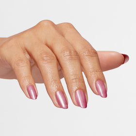OPI on-model hand wearing soft pink manicure for elegant everyday look