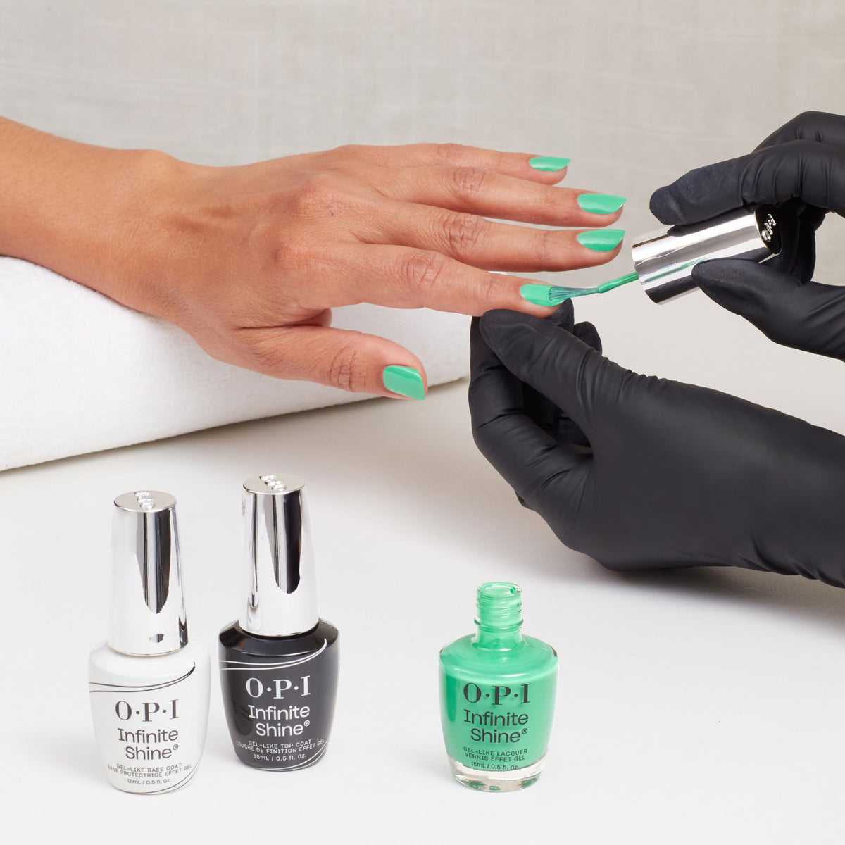 OPI bottle cap and brush detail showing ergonomic applicator for easy use