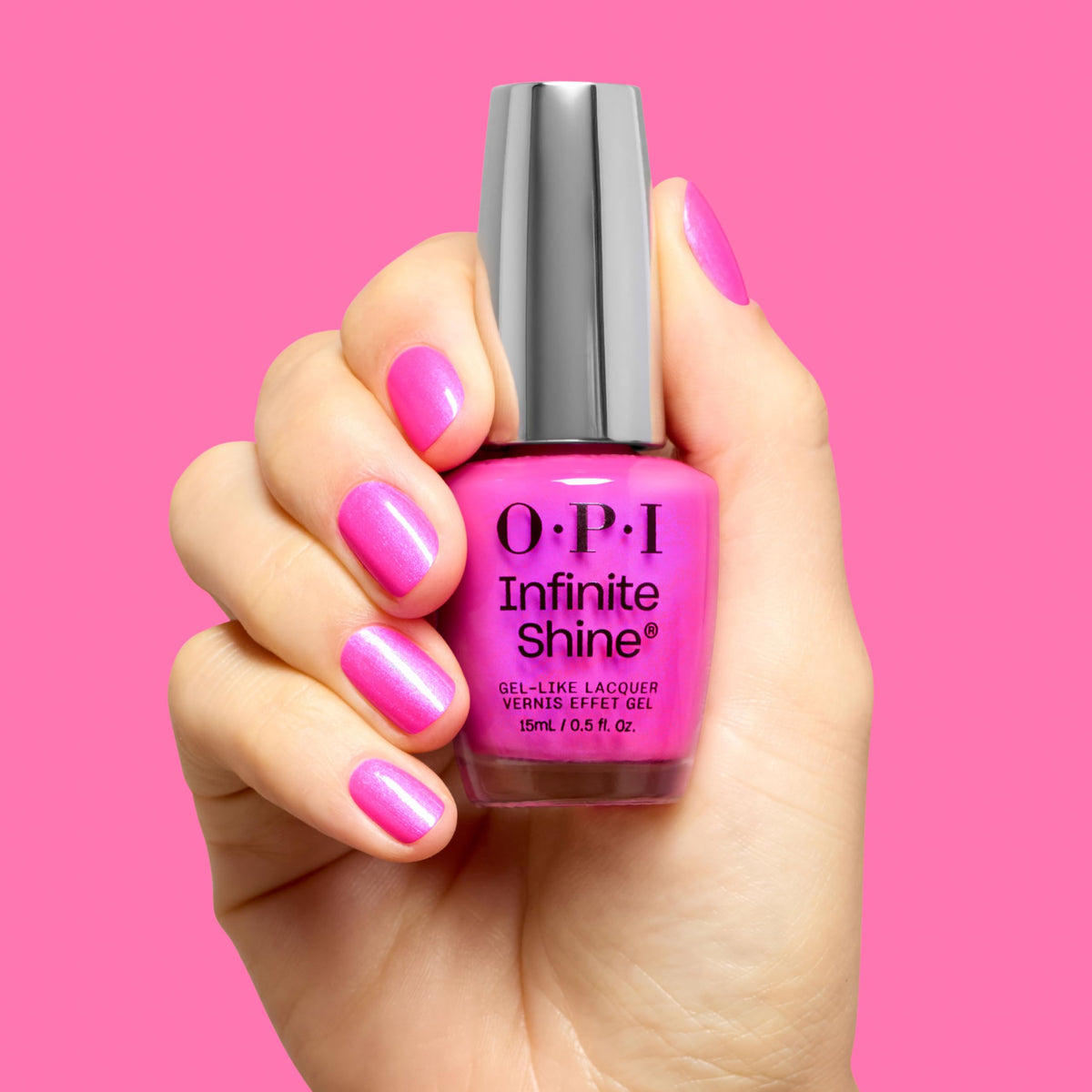 OPI nail swatch handshot showing wearable frosted pink with shimmer