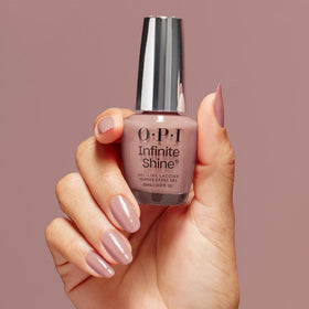 OPI Dulce de Leche bottle in hand for scale showing travel-friendly, professional benefit